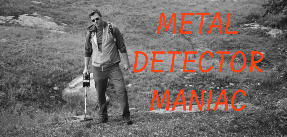 black and white Metal Detector Maniac movie banner featuring the titular metal detector maniac